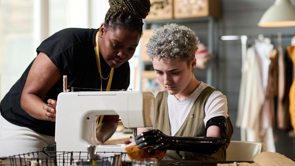 Inclusive apparel design using a sewing machine, featuring VELCRO® Brand hook and loop fasteners for adaptive clothing solutions.