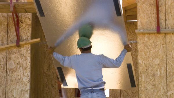 VELCRO® Brand Professional Series hook and loop fasteners used in construction for secure panel mounting and industrial fastening solutions.