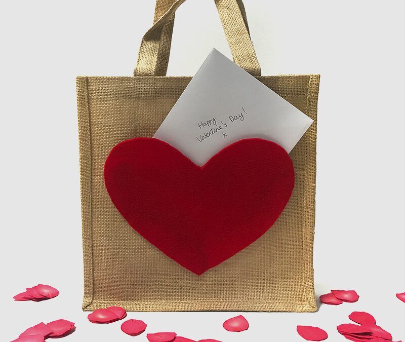 DIY burlap gift bag with red heart pocket and handwritten note