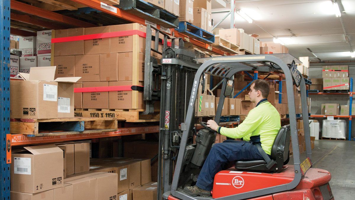 Warehouse worker managing inventory